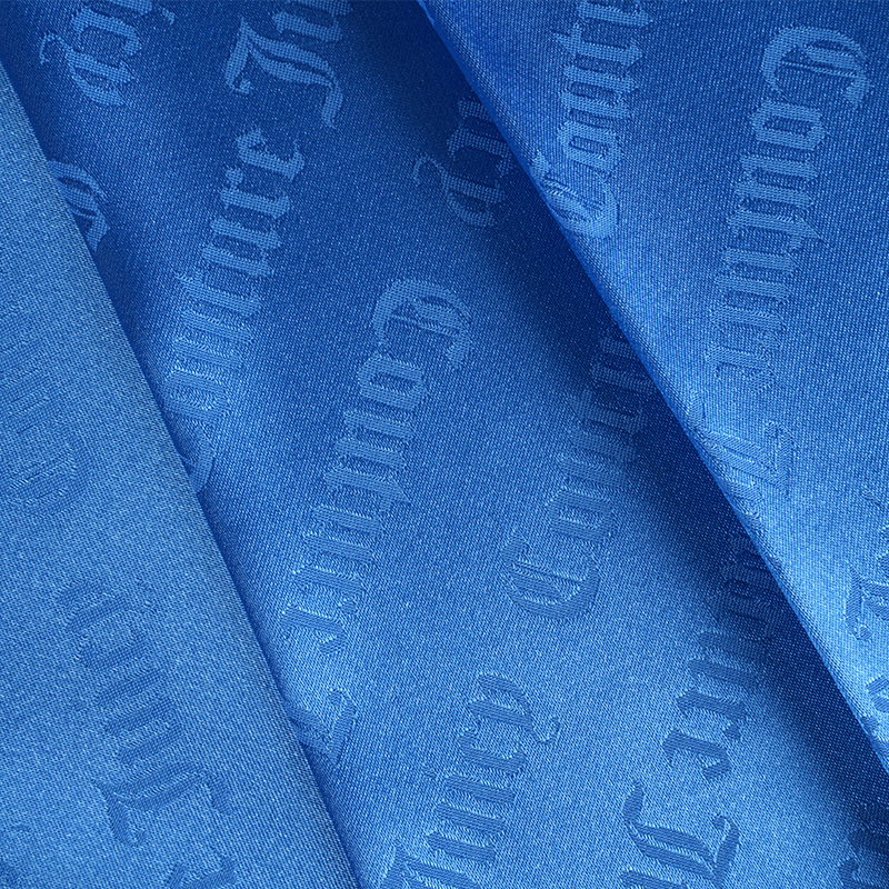 Tessuto jacquard con lettere in raso elasticizzato 75D