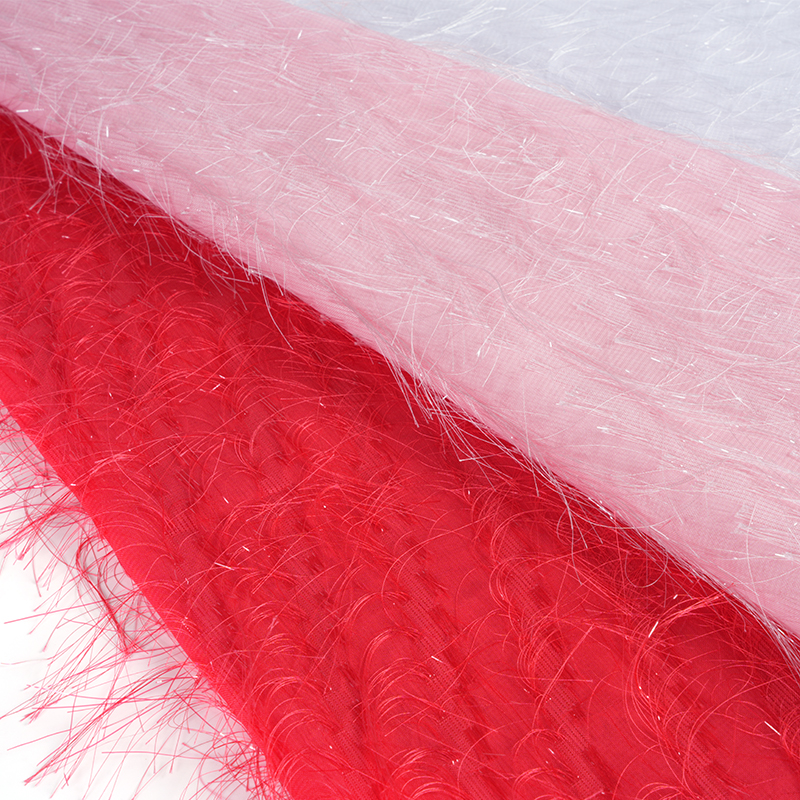 Tessuto Uragiri con fiori tagliati con nappe e paillettes 75D