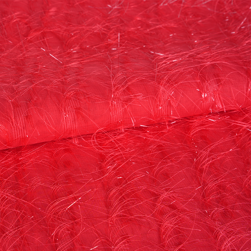 Tessuto Uragiri con fiori tagliati con nappe e paillettes 75D