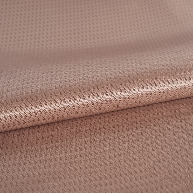 Piccolo jacquard con volo a freccia anteriore e posteriore in poliestere