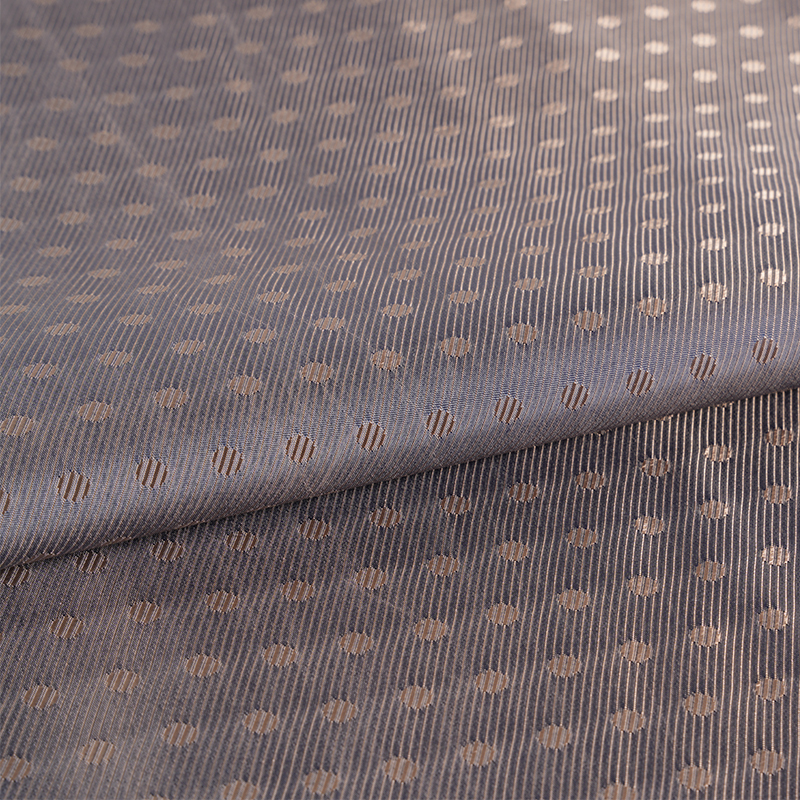 Tessuto jacquard a pois in twill PV