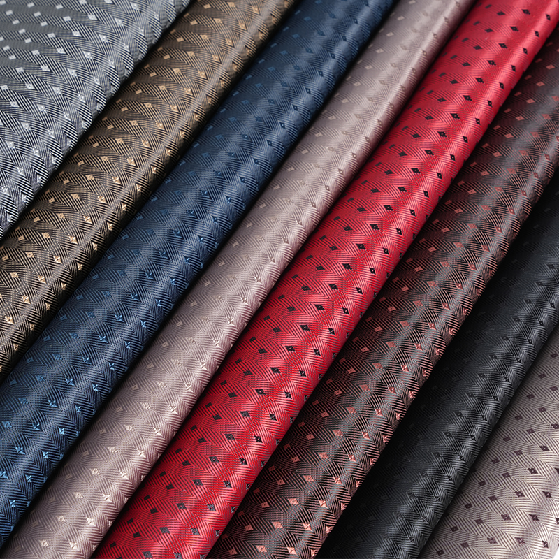 Tessuto a griglia diamantata con fondo in twill a spina di pesce PV